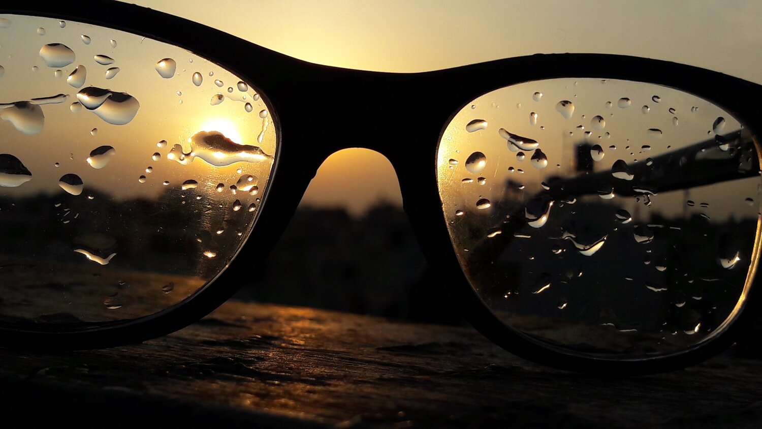 Sunset water drop on spectacles