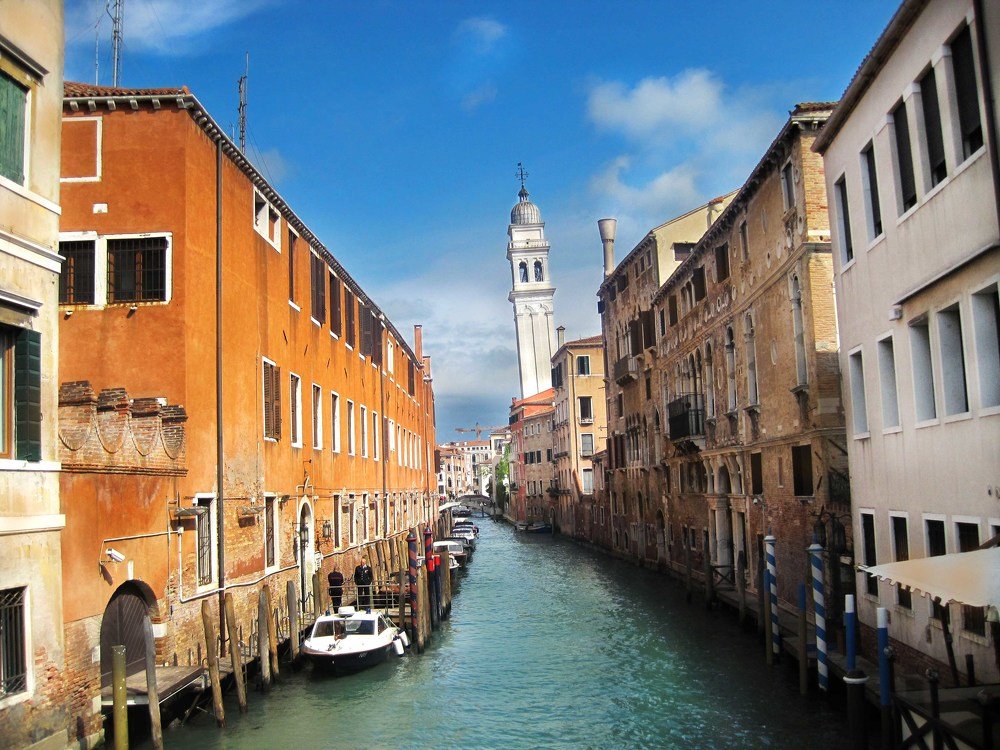 Venice beautiful view of the city, gondola, canal, gondoliers