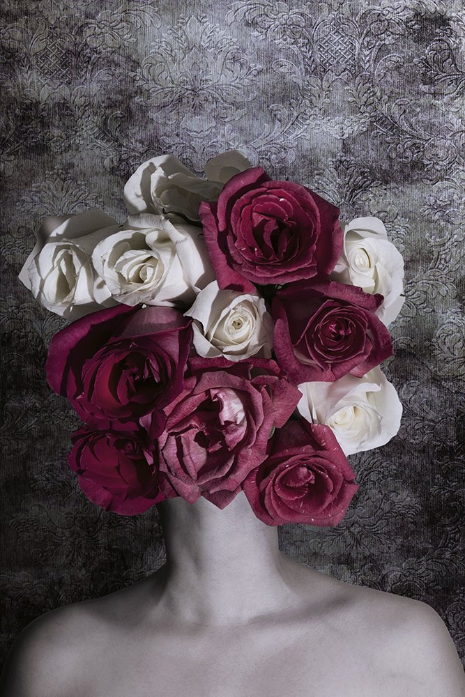 Woman with head of roses