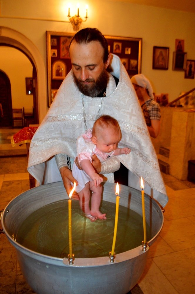 Крещени е младенца