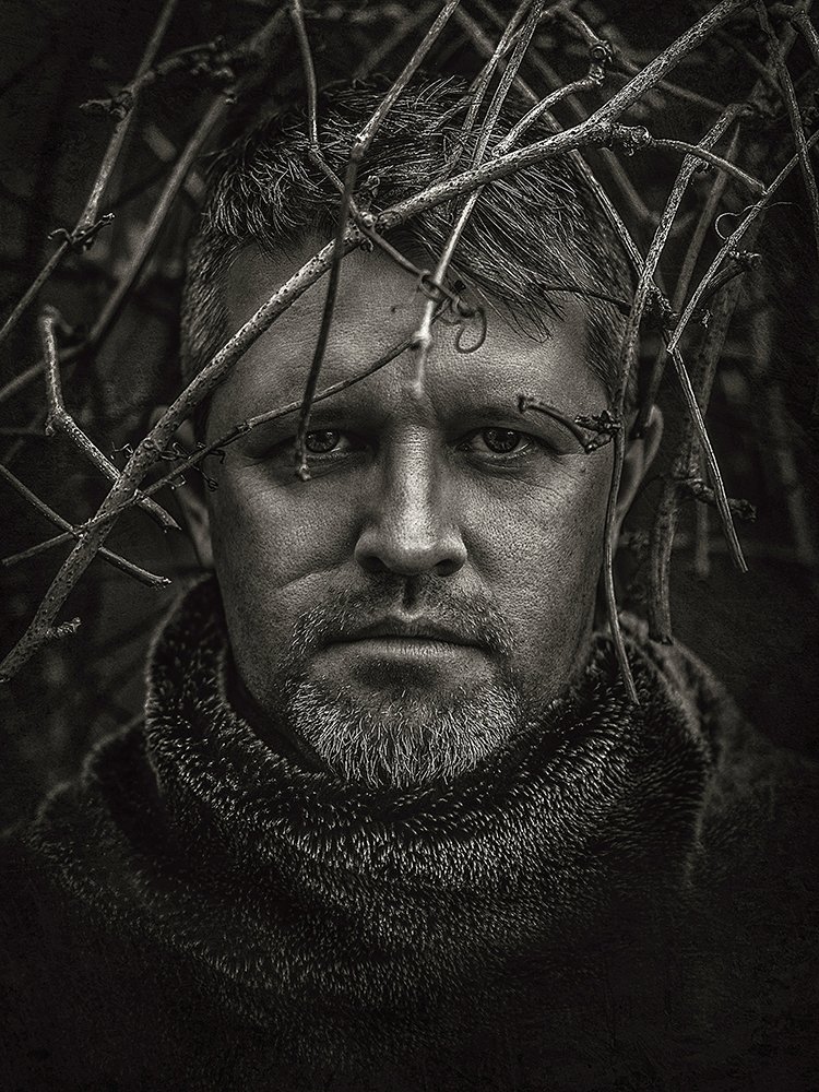 With head in branches