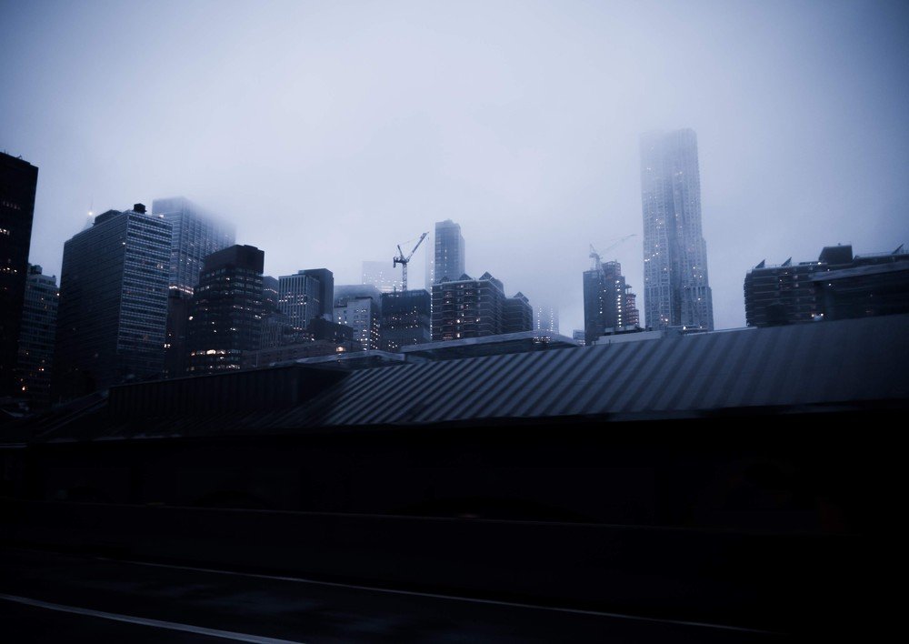Fog Envelopes New York at Night