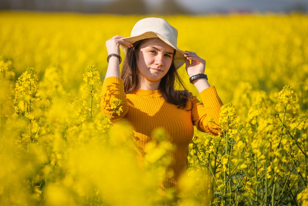 Portrait with canola flowers