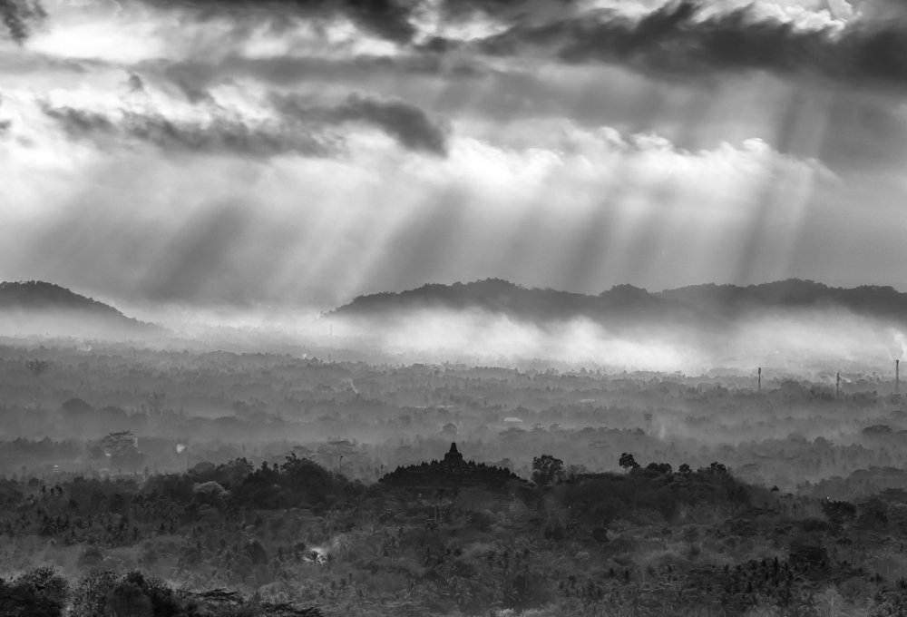 Amazing Ray of Lights over Borobudur Temple