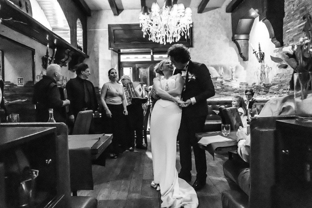 Bride and groom dance after wedding