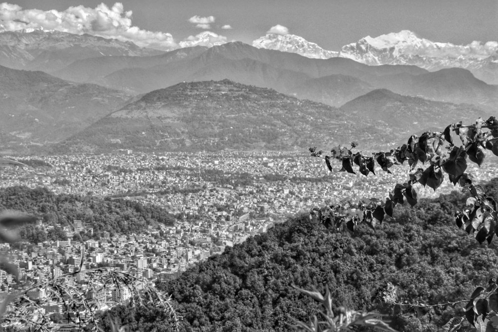 Black and white landscape of a city.