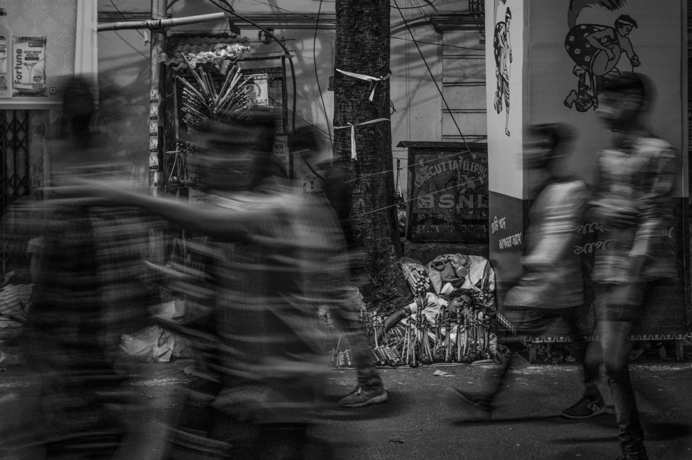 Street singer sleeps on street
