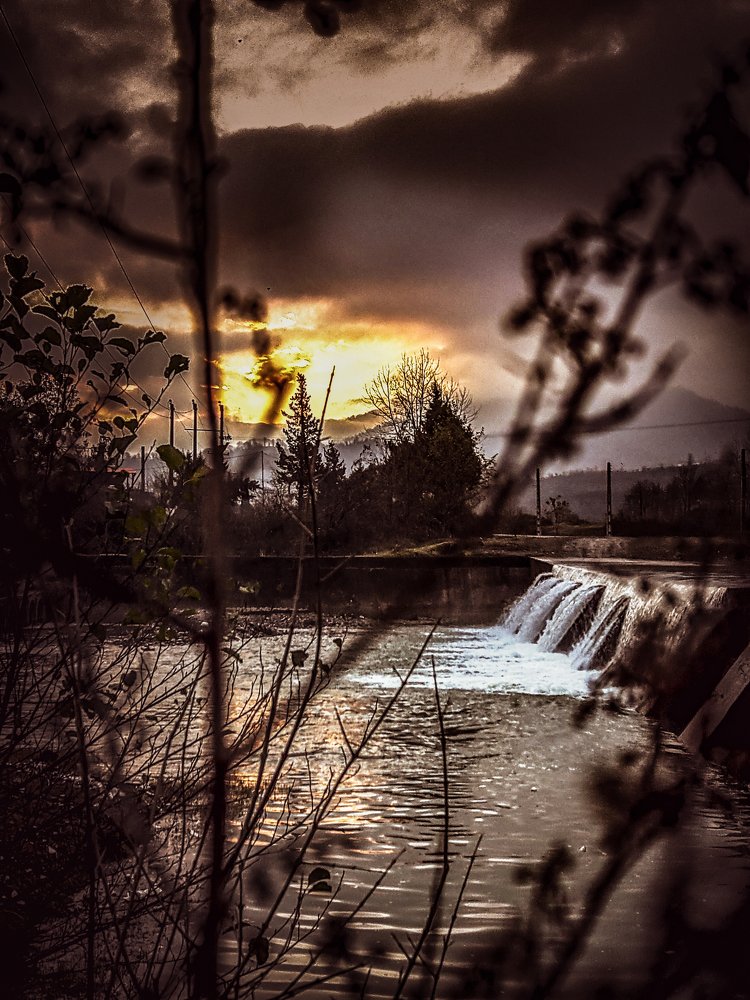 Waterfall with the sunset