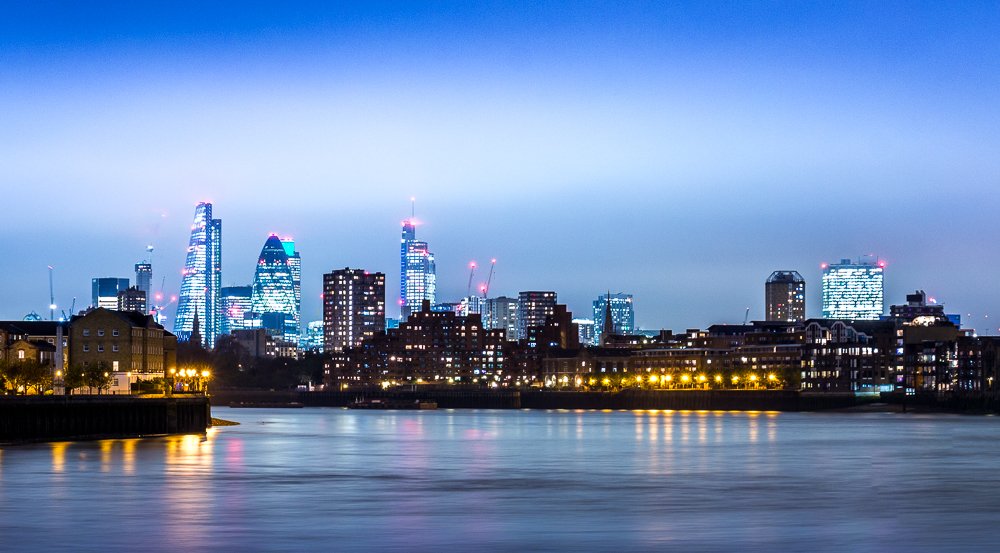 London city at night, view from the Thames.