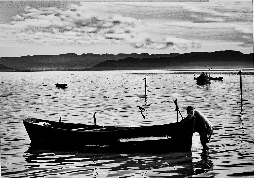 The end of the long day of a fisherman man