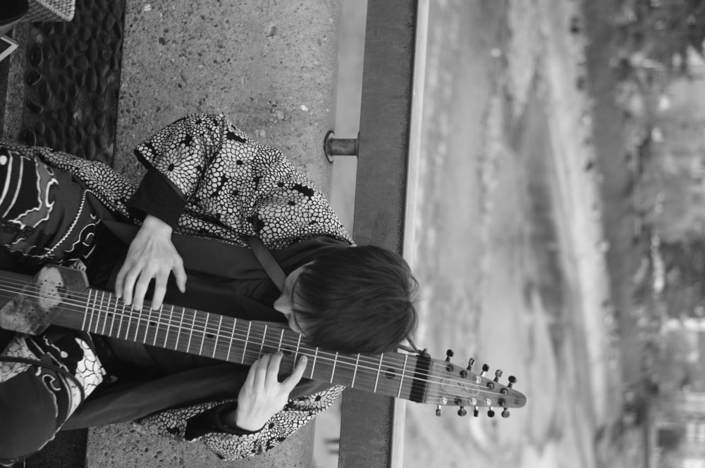 Street Musician in Kamo River