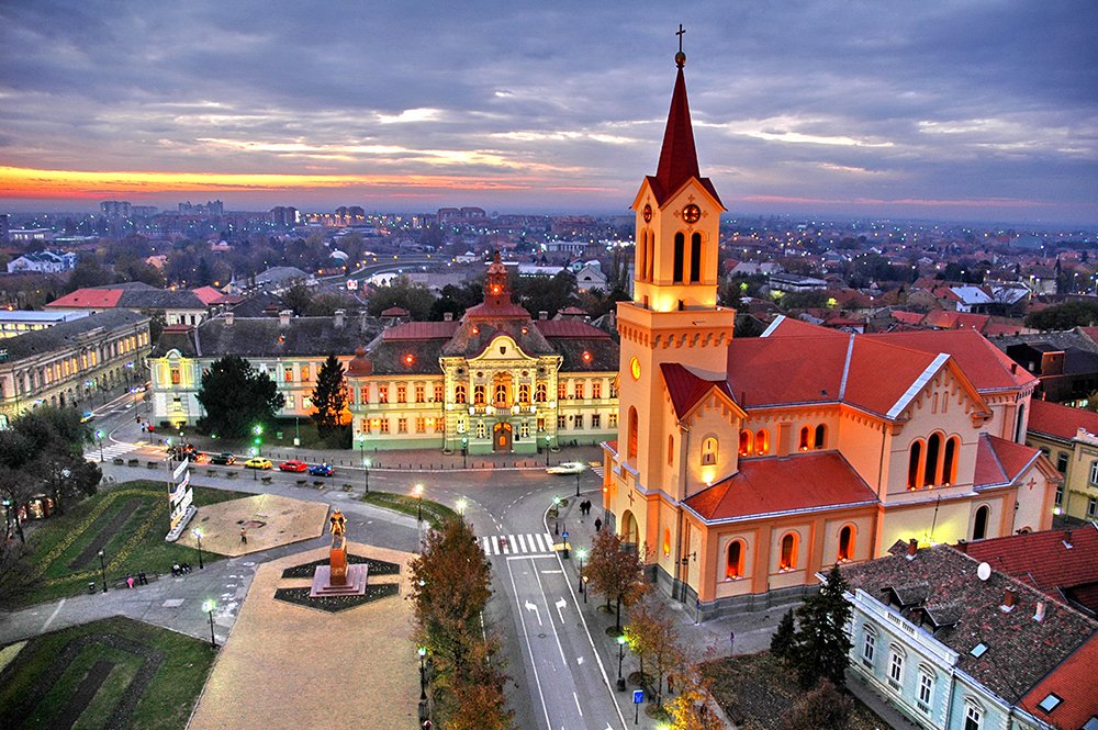 City square at night.