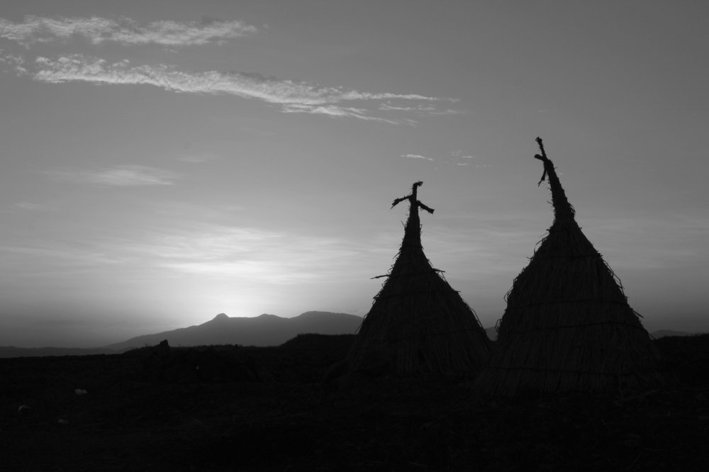 sunset vs traditionally made shelter.