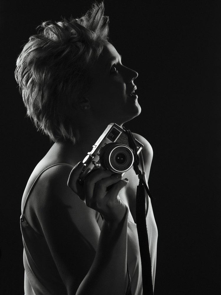 Девушка-фотограф
