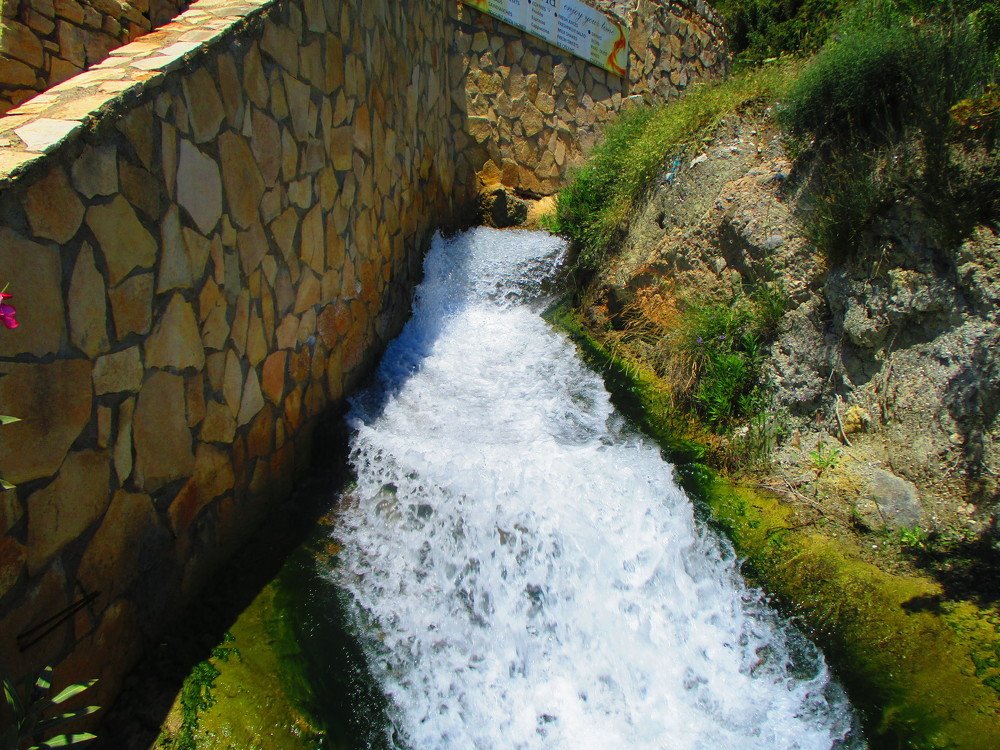 Waterfall in Ligres beach in south Crete