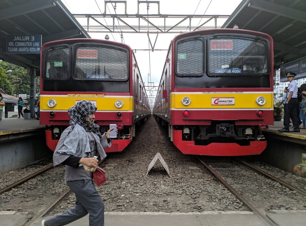 running in train station