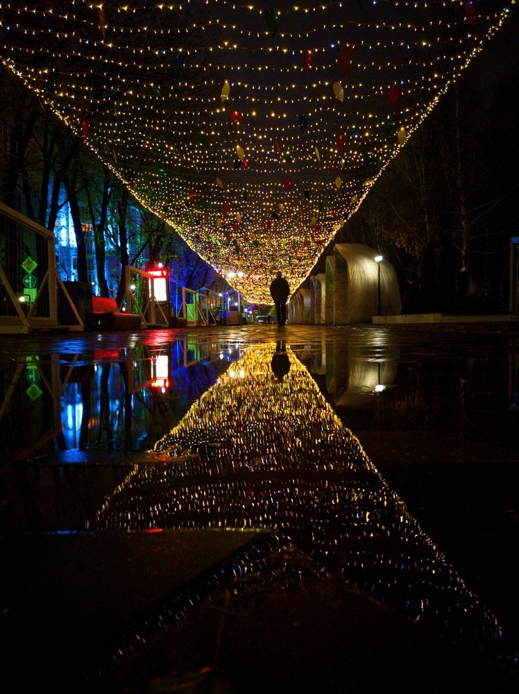 Отражение арбата Астаны после дождя