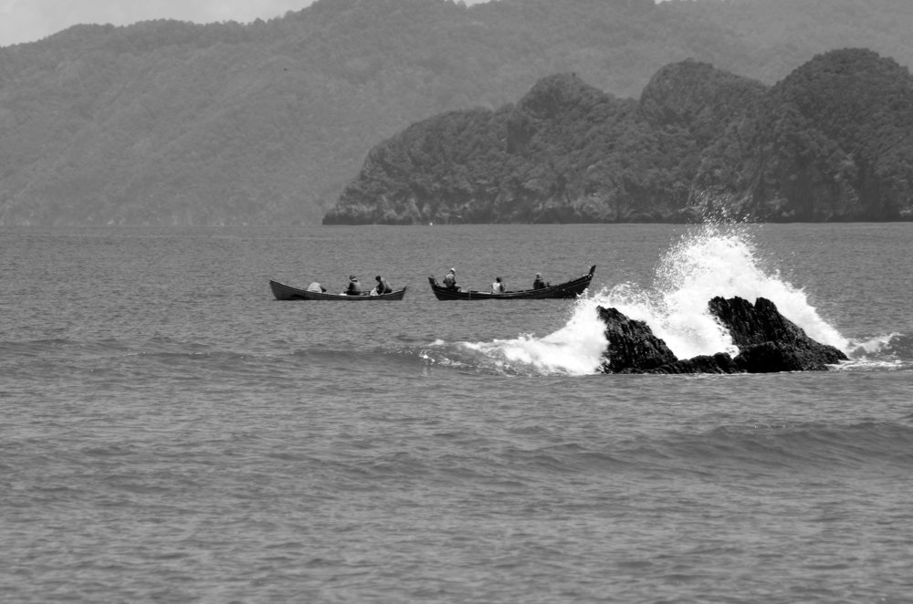 the waves hit the rock