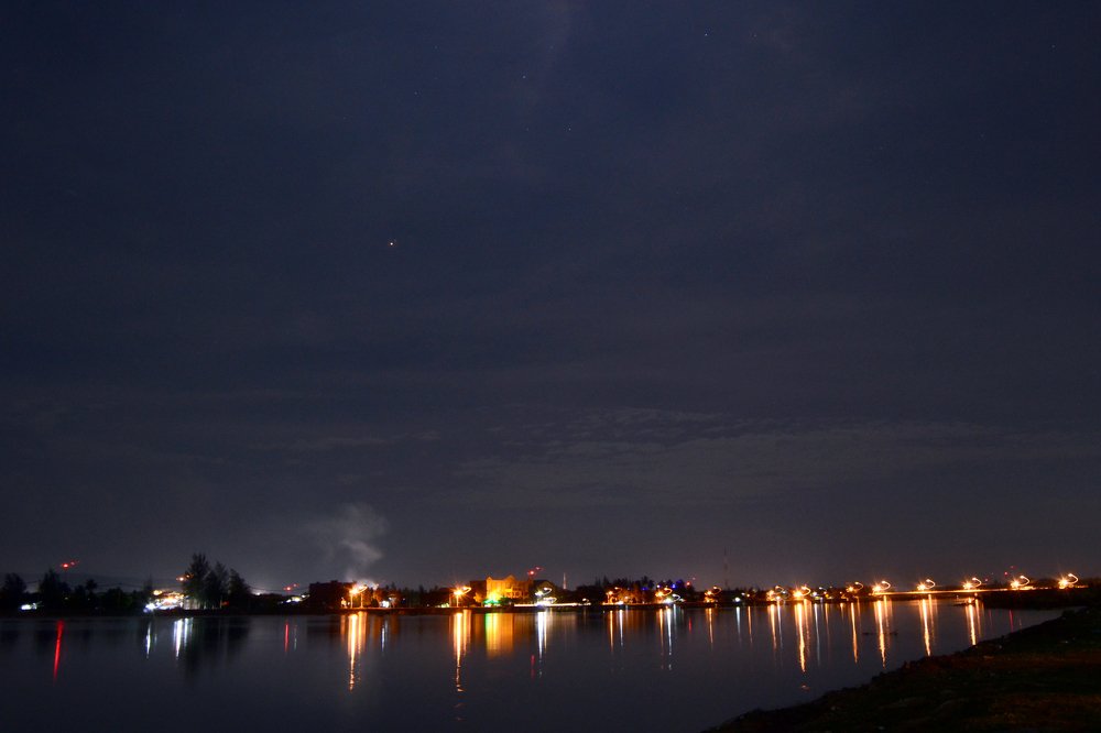 reflection of the city light on the river water