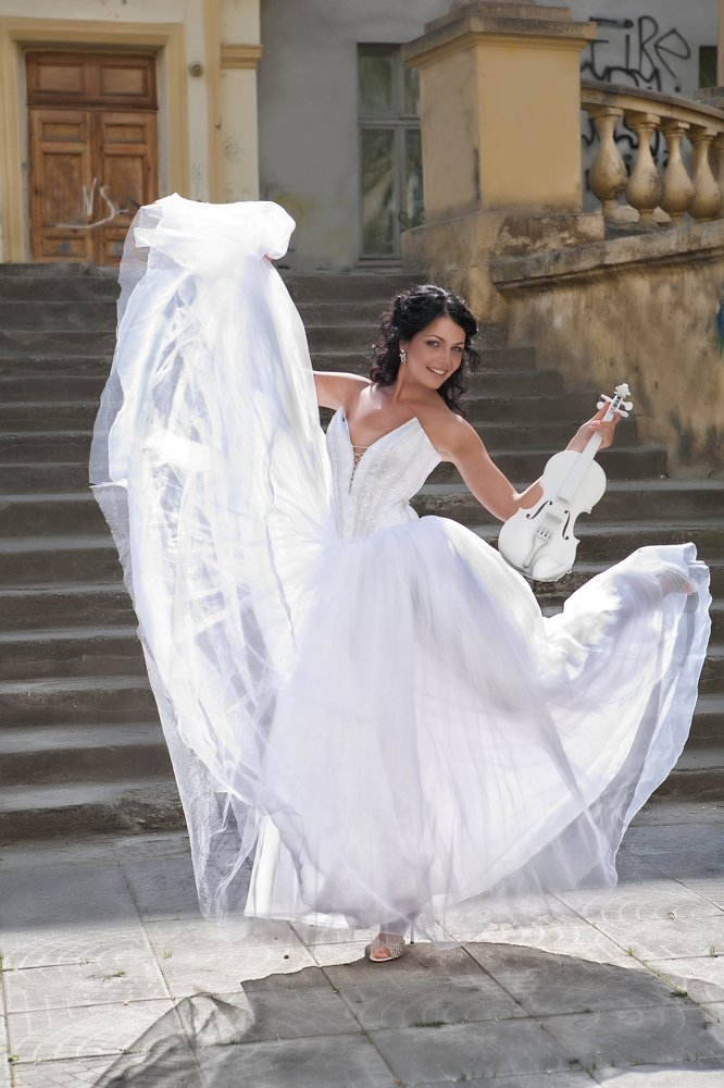 Young Bride And White Violin