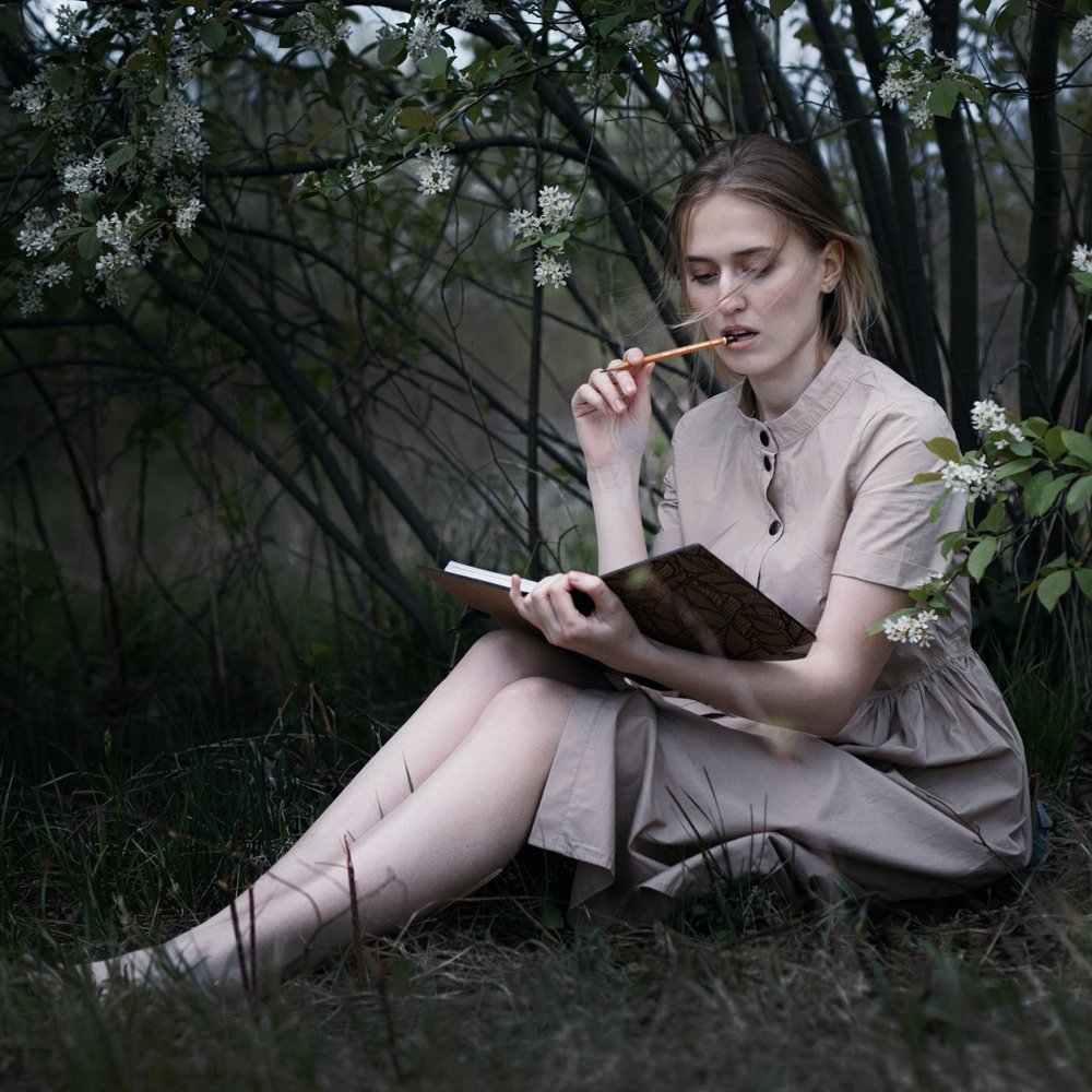 Oak notepad under bird cherry tree