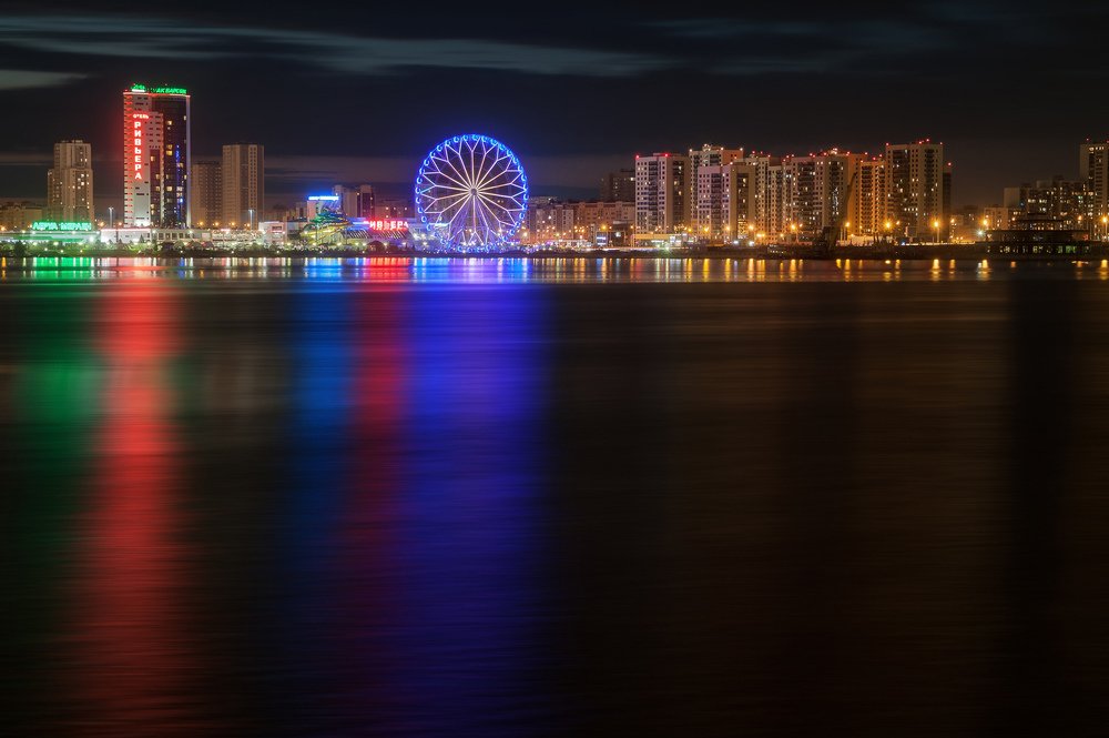 Город скользящий по глади реки