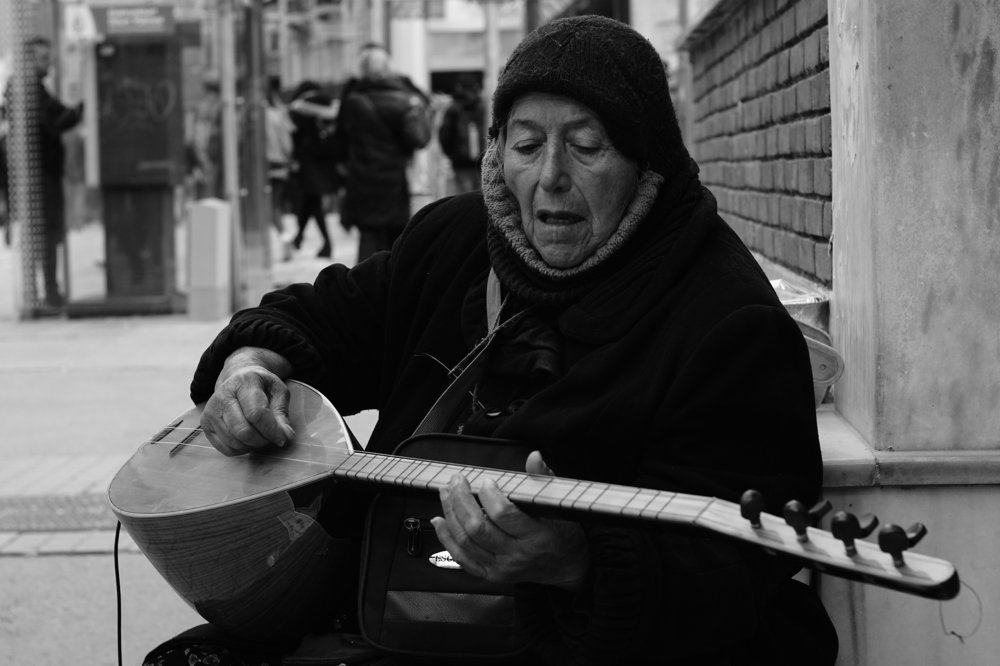 Woman playing instrument