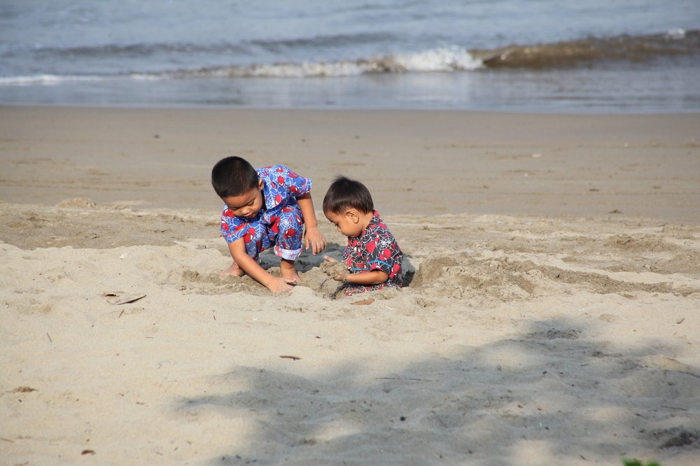 playing beach sand