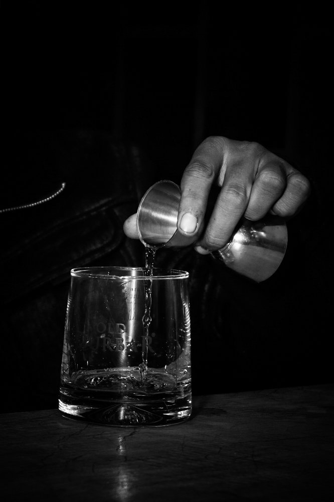 The whiskey in the glass..