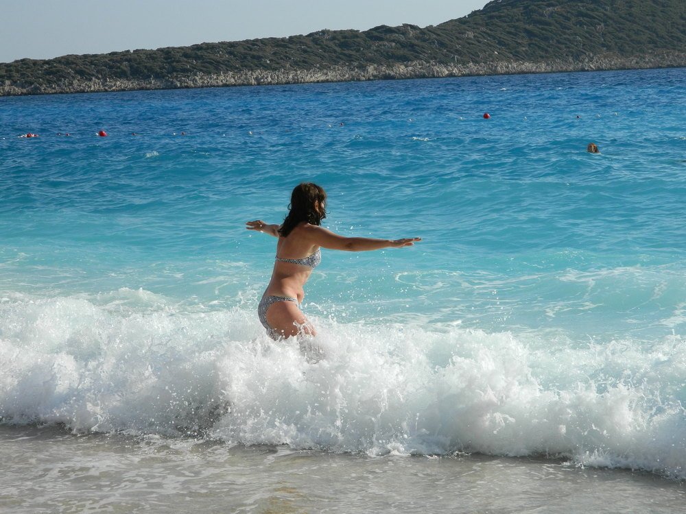 girl and restless waves