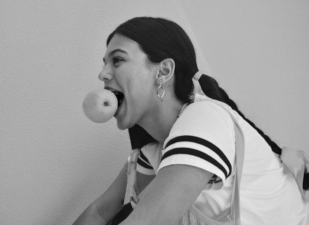 Looking like flying with an apple