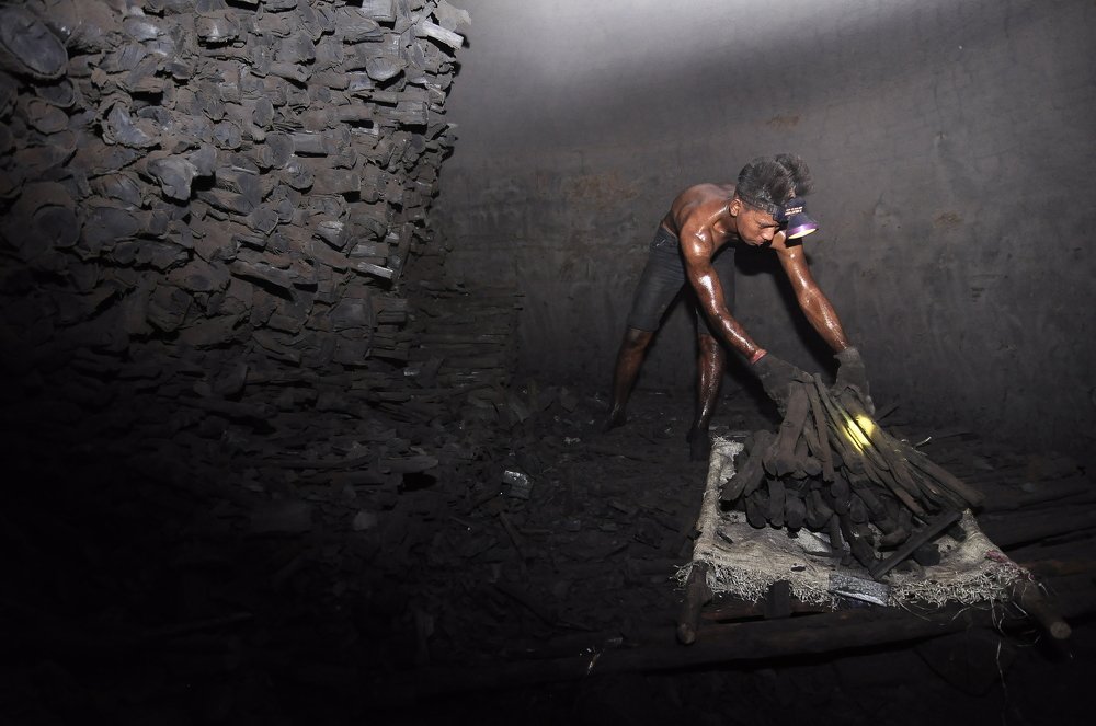 Charcoal Kitchen Worker