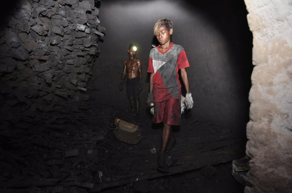 Charcoal Kitchen Worker