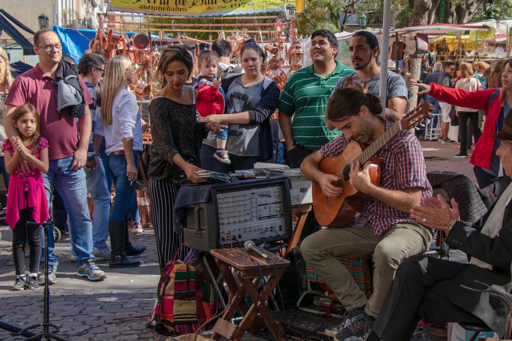 Street musician on Defense street, Buenos Aires city