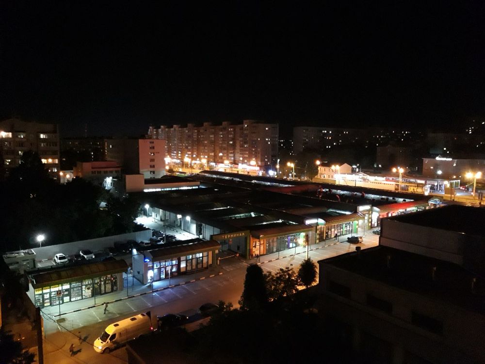 Город