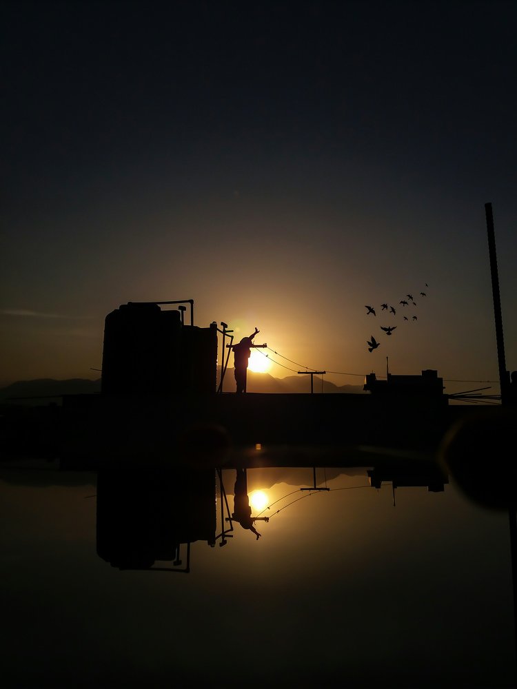 Children's playing with sunset