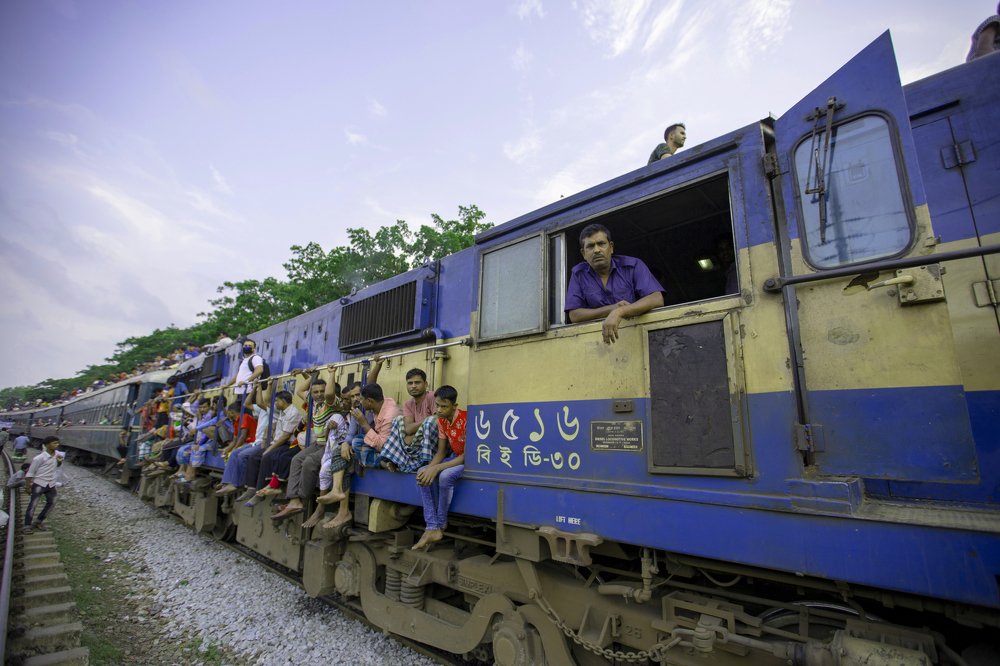 Undefined people live on train engine way to home meet family