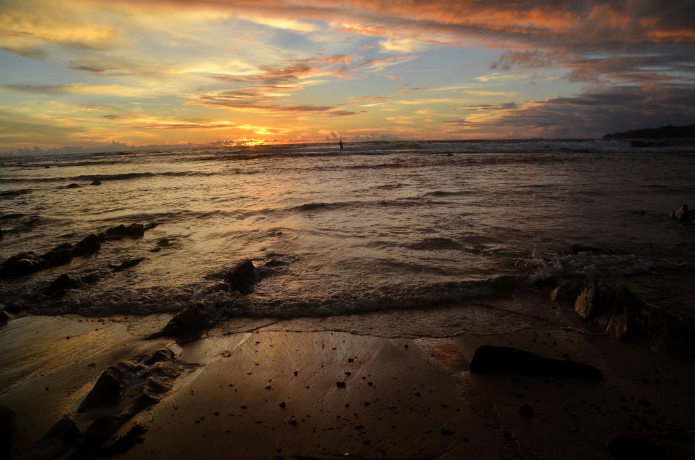 one man in the sunset