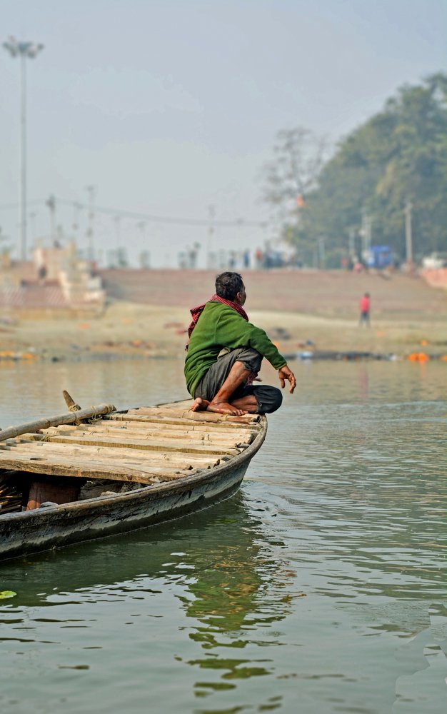 Fisherman Sitting boat