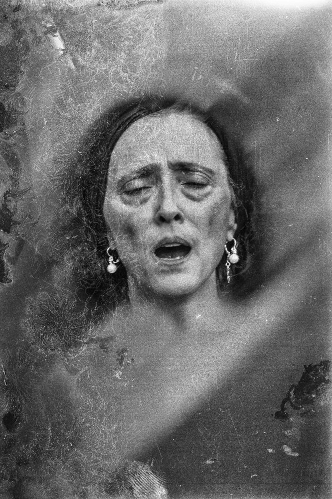 women with pearl earrings