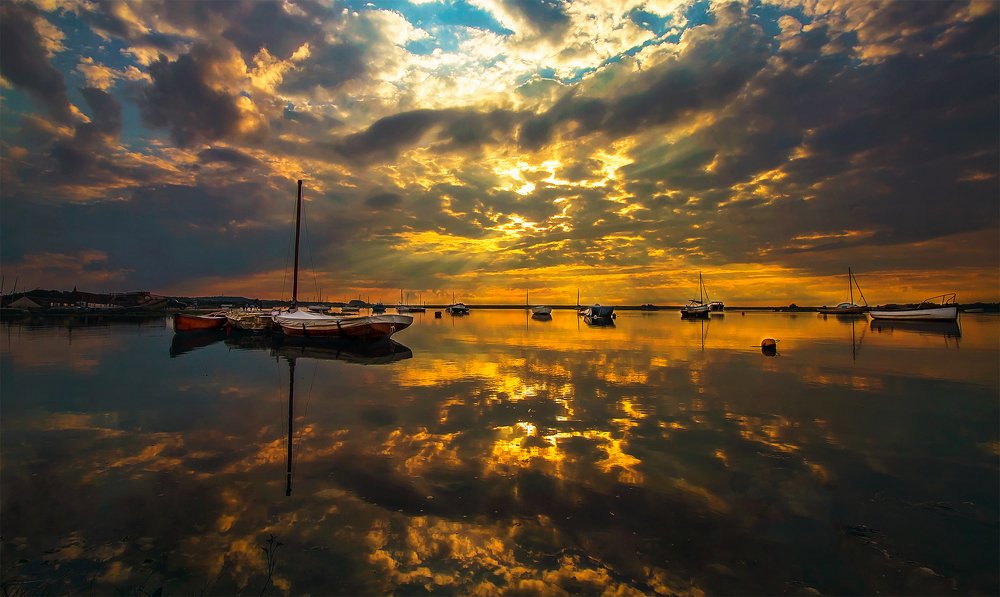 Sunset over Burnham Overy Staithe harbour