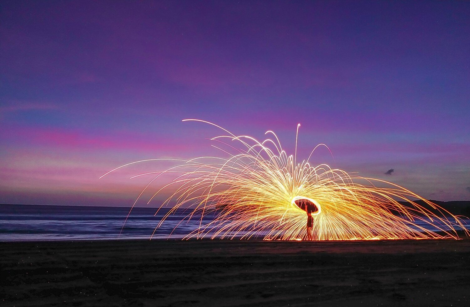 Beauty sunset moment at serang beach with steelwool photography