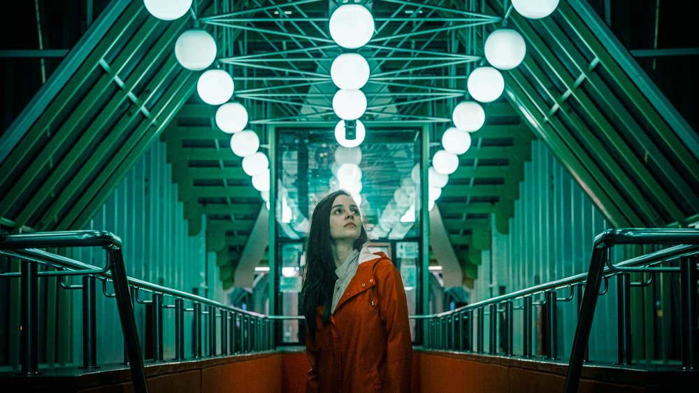 В центре симметрии.