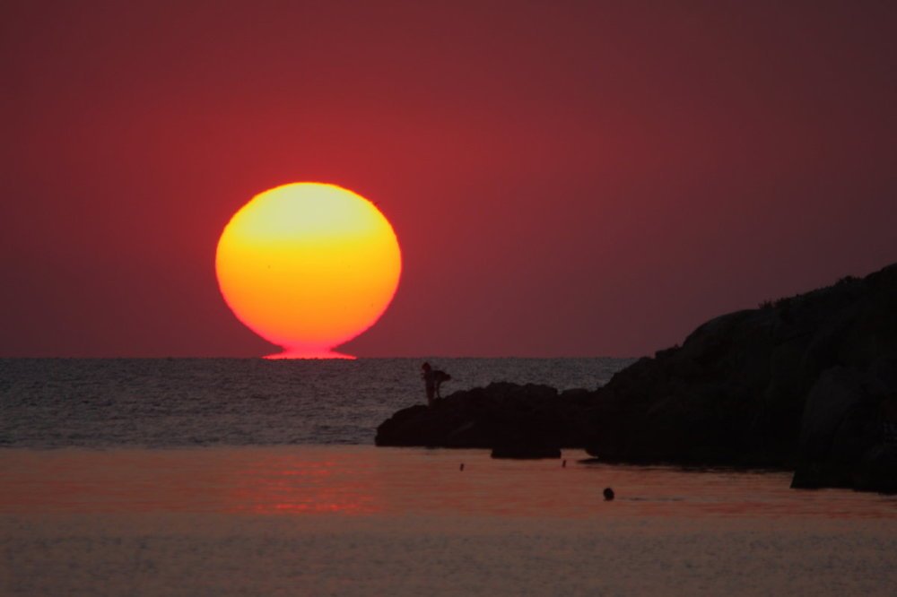 Поцелуй солнца и моря