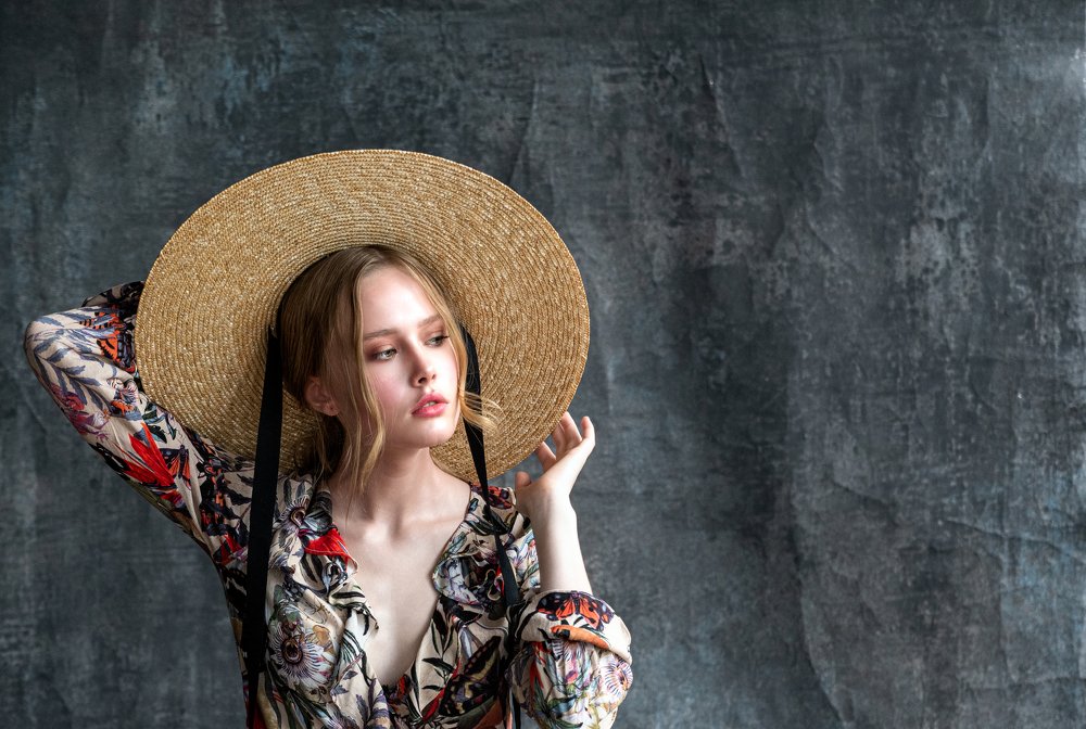 Portrait of girl with straw hat