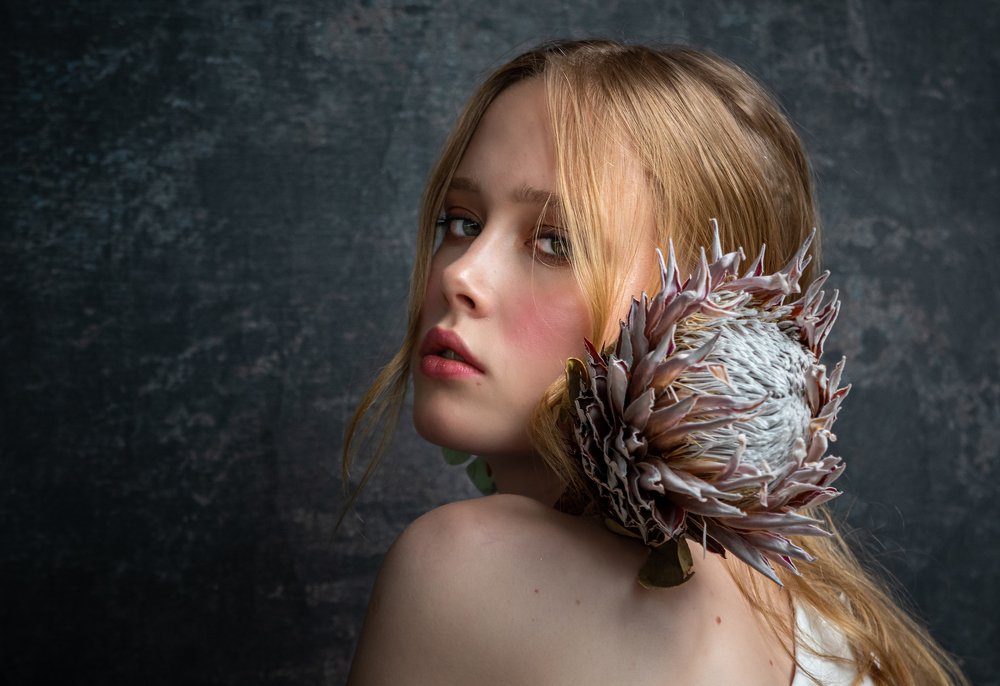Girl with a dried flower