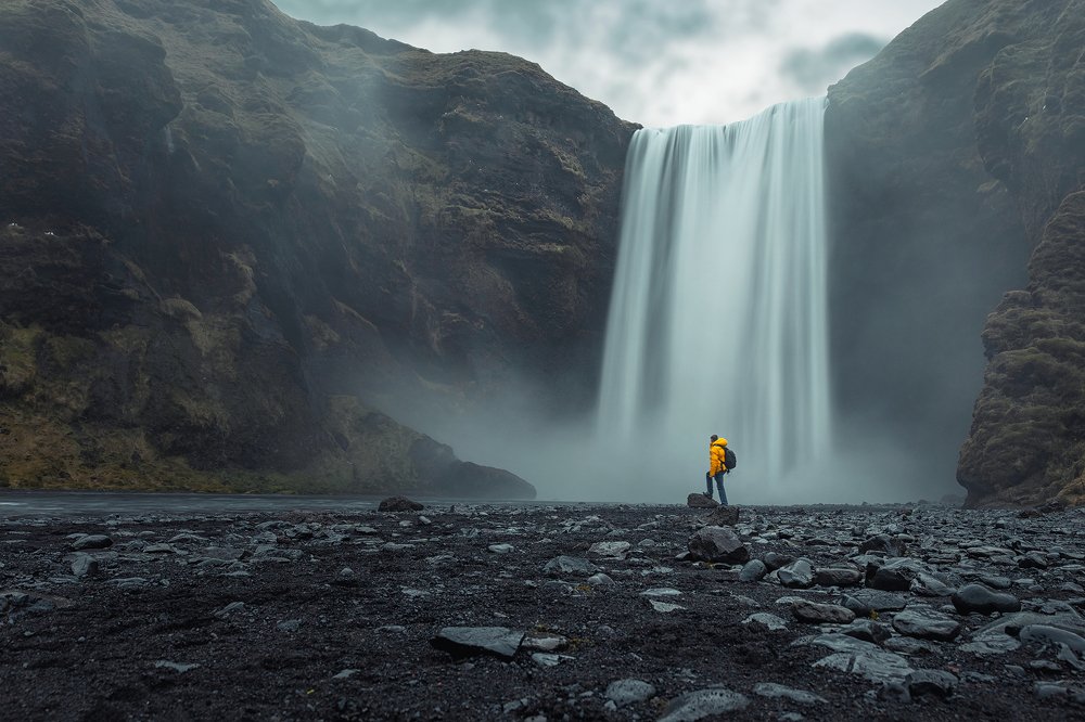 Skogafoos with a man