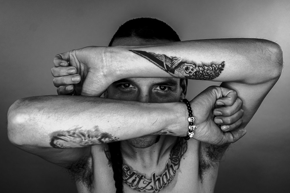 The man with tattoos