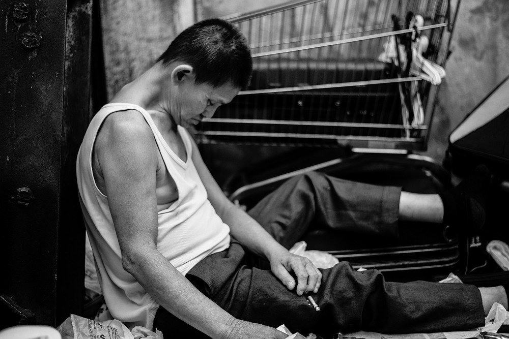 Old man sleeping on the street