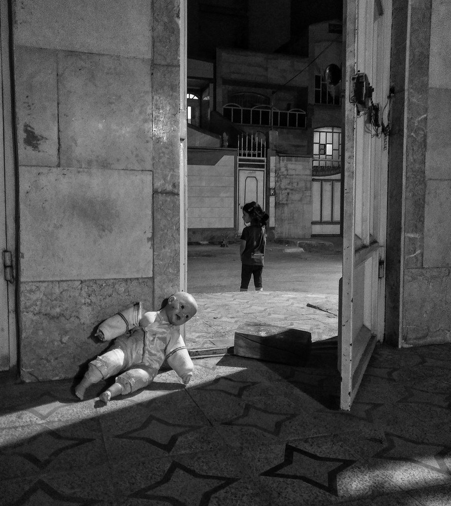 little girl in street